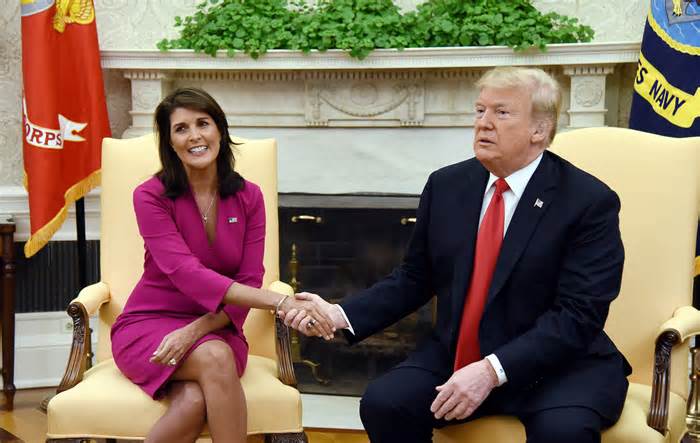 President Trump shakes hands with Nikki Haley, the United States Ambassador to the United Nations in the Oval office of the White House on Oct. 9, 2018 in Washington, DC. Nikki Haley resigned as the US ambassador to the United Nations, in the latest departure from President Donald Trump's national security team. Meeting Haley in the Oval Office, Trump said that Haley had done a 