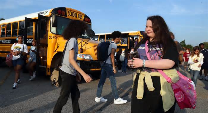 Students move around the Jefferson County Public Schools Detrick Depot as part of the second morning transfer prior to the start of school on Monday, Aug. 21, 2023, in Louisville, Kentucky.