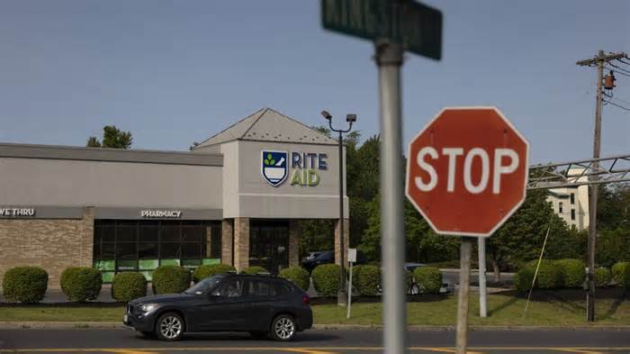 Rite Aid filed for bankruptcy Sunday and will likely close hundreds of stores. - Angus Mordant/Bloomberg/Getty Images
