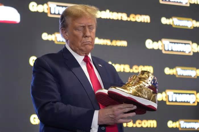 Trump hawks $399 branded shoes at 'Sneaker Con,' a day after a $355-million ruling against him