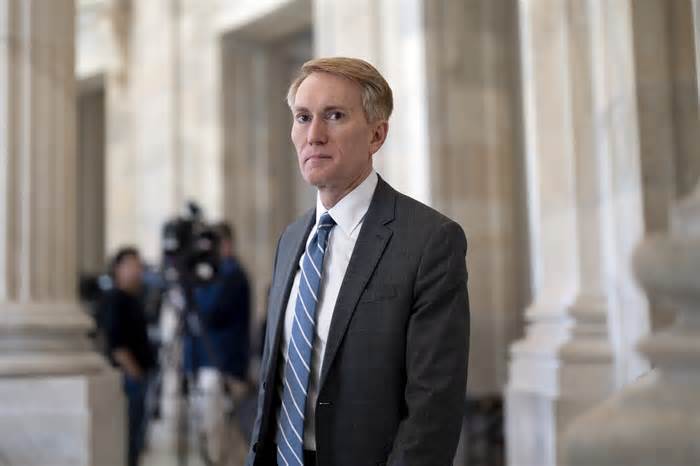 Sen. James Lankford, R-Okla., the lead GOP negotiator on the Senate border and foreign aid package, does a TV news interview at the Capitol in Washington, Monday, Feb. 5, 2024. (AP Photo/J. Scott Applewhite) (Photo: via Associated Press)
