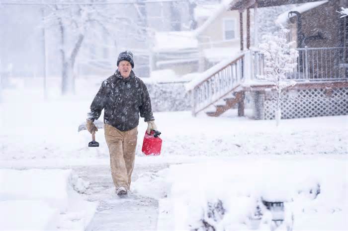 Central and eastern US slammed by winter storm: See the damage from tornados and blizzards