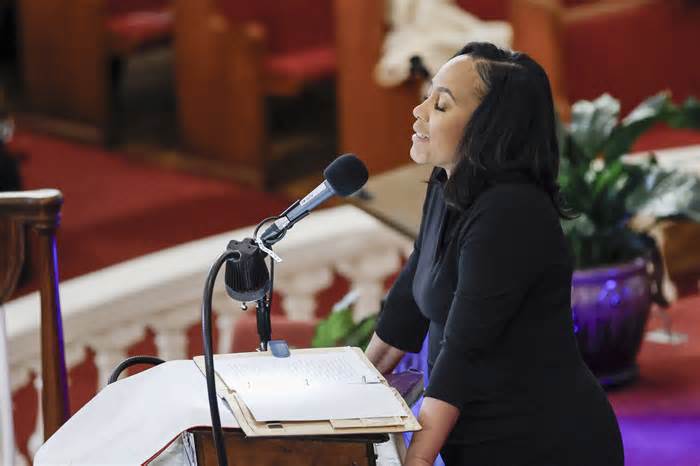 Fulton County District Aattorney Fani Willis reacts as she speaks during a worship service at the Big Bethel AME Church, on Sunday, Jan. 14, 2024, in Atlanta. The service celebrated Rev. Martin Luther King Jr. at the historic Black church. (Miguel Martinez/Atlanta Journal-Constitution via AP)