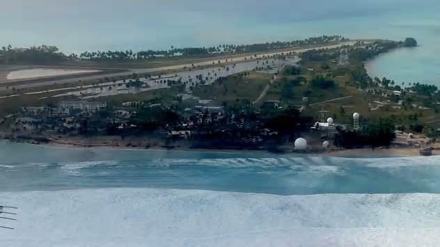 A view, via aircraft, of the damaged area on the north shore of Roi-Namur, an island in Kwajalein Atoll.