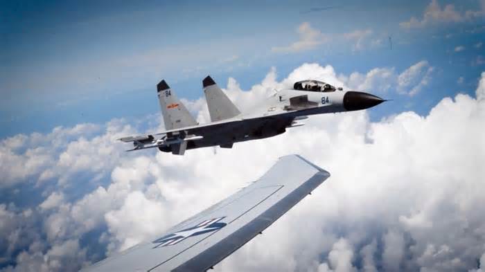 Watch: Chinese fighter jet flies dangerously close to US military plane