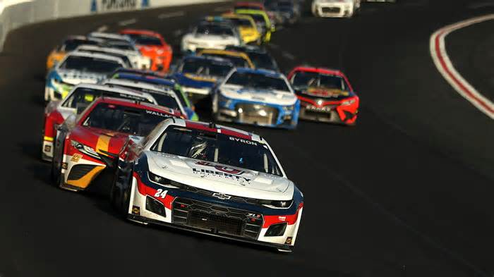 William Byron, driver of the #24 Liberty University Chevrolet, leads the field during the NASCAR Cup Series Folds of Honor QuikTrip 500 at Atlanta Motor Speedway on March 20, 2022 in Hampton, Georgia.