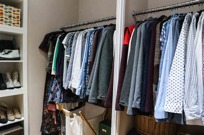 10 Things You Should Never Store In Your Bedroom Closet, According To Experts