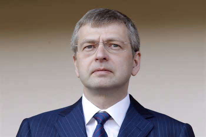 FILE - President of the football club AS Monaco, Dmitry Rybolovlev, attends a French league two soccer match between Monaco and Caen at the Louis II stadium on May 4, 2013, in Monaco. Rybolovlev who accused Sotheby’s of teaming up with a Swiss art dealer to cheat him of tens of millions of dollars became tearful in court Friday, Jan. 12, 2024 as he testified that he considered the dealer to be like family before discovering he'd been defrauded by an “art market that needs to be more transparent.” (AP Photo/Lionel Cironneau, File)