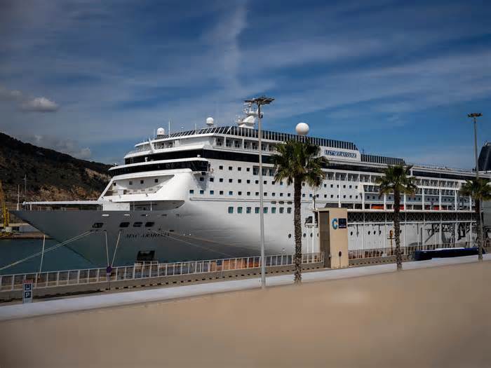 A cruise ship stuck in Barcelona resumes sailing after passengers accused of having fake visas were removed and investigated by authorities