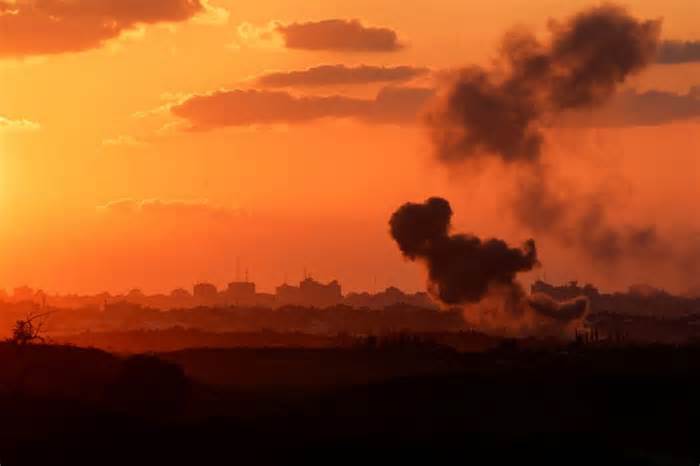 FILE PHOTO: A view shows smoke in the Gaza Strip as seen from Israel's border with the Gaza Strip, in southern Israel