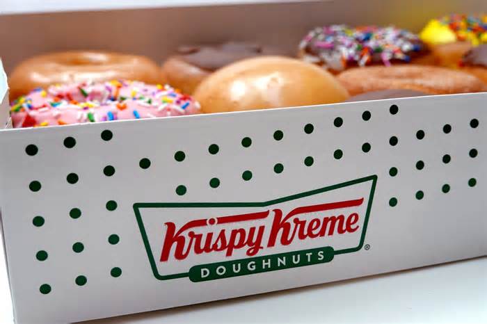 Krispy Kreme donuts at a Chicago store in May 2021. On Monday, Nov. 13, 2023, participating Krispy Kreme locations will be giving out a dozen free donuts to the first 500 customers.