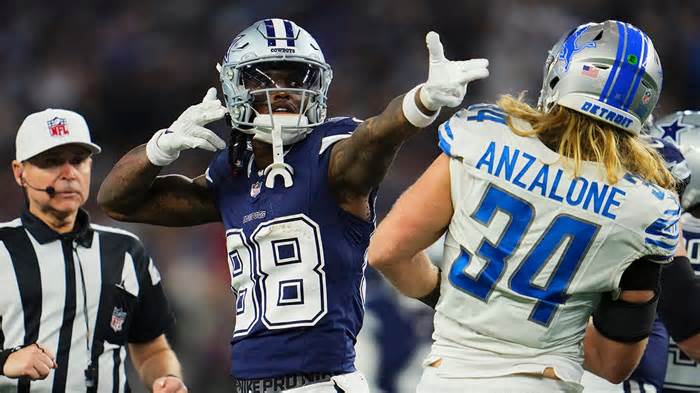 CeeDee Lamb #88 of the Dallas Cowboys celebrates after a play against the Detroit Lions during the second half at AT&T Stadium on December 30, 2023 in Arlington, Texas.
