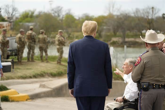 Republican presidential candidate Donald Trump with Texas Gov. Greg Abbott during a visit on Thursday to the U.S.-Mexico border in Eagle Pass, Tex.
