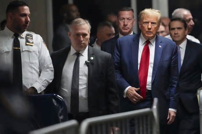 FILE - Former President Donald Trump leaves Manhattan criminal court, Feb. 15, 2024, in New York. Trump's hush money case is set for a crucial hearing Monday, March 25, as a judge weighs when or even whether Trump will go on trial. (AP Photo/Mary Altaffer, File)