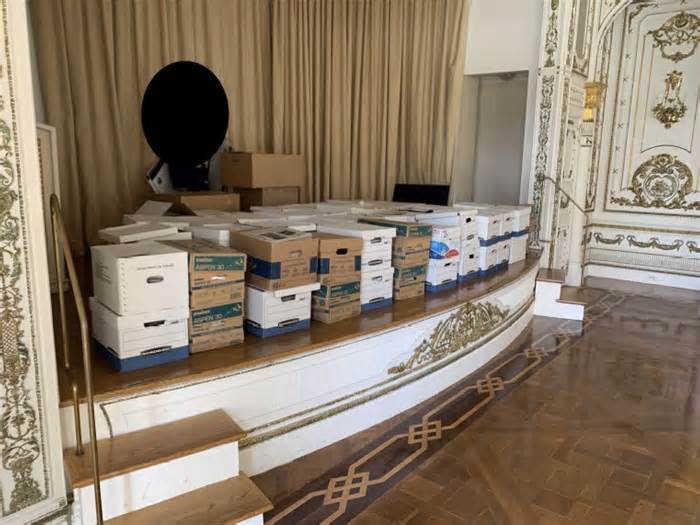 This image, contained in the indictment against former president Donald Trump, shows boxes of records being stored on the stage in the White and Gold Ballroom at Trump’s Mar-a-Lago estate in Palm Beach, Fla. Trump is facing 37 felony charges related to the mishandling of classified documents according to an indictment unsealed in June. (Justice Department via AP)