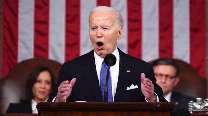 FILE - President Joe Biden delivers the State of the Union address to a joint session of Congress at the Capitol, March 7, 2024, in Washington. Seated at left is Vice President Kamala Harris and at right is House Speaker Mike Johnson, R-La. Biden made abortion and reproductive rights a central theme of his State of the Union speech, but he never mentioned the word 