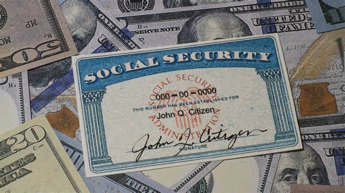 Lake Elsinore, CA, USA – January 30, 2022: Fake Social security card on prop fake US currency