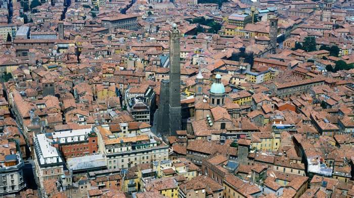 The Garisenda, seen next to the higher Asinelli tower, leans at a four-degree angle. - DeAgostini/Getty Images
