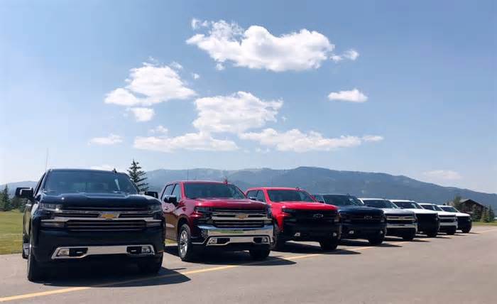 FILE PHOTO: Eight versions of General Motors CO’s new generation Chevrolet Silverado pickups are pictured lined up at an event near Alpine