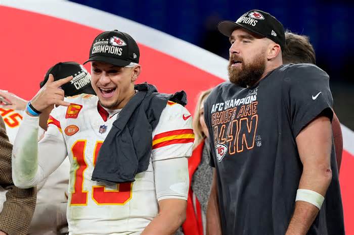 Kansas City Chiefs quarterback Patrick Mahomes, left, and Kansas City Chiefs tight end Travis Kelce stand on the stage after an AFC Championship NFL football game against the Baltimore Ravens, Sunday, Jan. 28, 2024, in Baltimore. The Kansas City Chiefs won 17-10. (AP Photo/Alex Brandon) ORG XMIT: AFC528