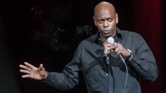 Comedian Dave Chappelle performs at Xfinity Theatre August 23, 2014 in Hartford, Connecticut.