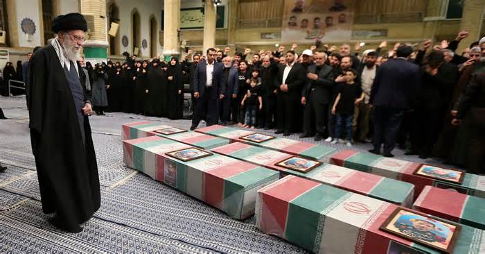 Iran's Supreme Leader, Ayatollah Ali Khamenei looks at the coffins of members of the Islamic Revolutionary Guard Corps who were killed in the Israeli airstrike on the Iranian embassy complex in the Syrian capital Damascus, during a funeral ceremony in Tehran, Iran April 4, 2024. Office of the Iranian Supreme