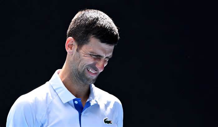 Novak Djokovic grimacing