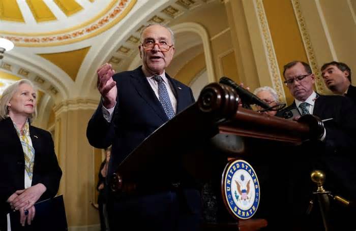 FILE PHOTO: Schumer speaks to reporters at the Capitol in Washington