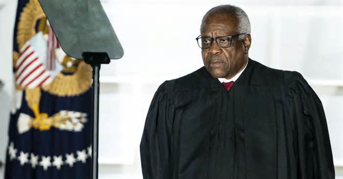 Clarence Thomas, associate justice of the U.S. Supreme Court, listens during a ceremony on the South Lawn of the White House in Washington, D.C., U.S., on Monday, Oct. 26, 2020.