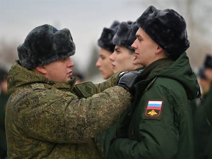 Misbehaving Russian troops were tossed in 'pits' at military training grounds for up to a week at a time, a deserted soldier says