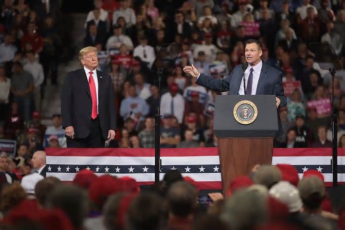 Then Republican candidate for governor of Kansas Kris Kobach speaks at a rally with President Donald Trump at the Kansas Expocenter on Oct. 6, 2018, in Topeka, Kansas.