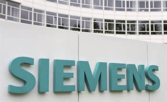 A Siemens logo is pictured on an office building of Siemens AG in Munich