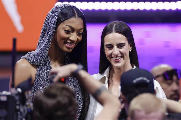 CORRECTS TO CAITLIN CLARK NOT CAITLYN CLARK - LSU's Angel Reese, left, and Iowa's Caitlin Clark, right, pose for a photo before the WNBA basketball draft, Monday, April 15, 2024, in New York. (AP Photo/Adam Hunger) (Photo: via Associated Press)