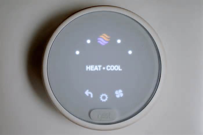 A Nest smart thermostat in an Oklahoma City home.