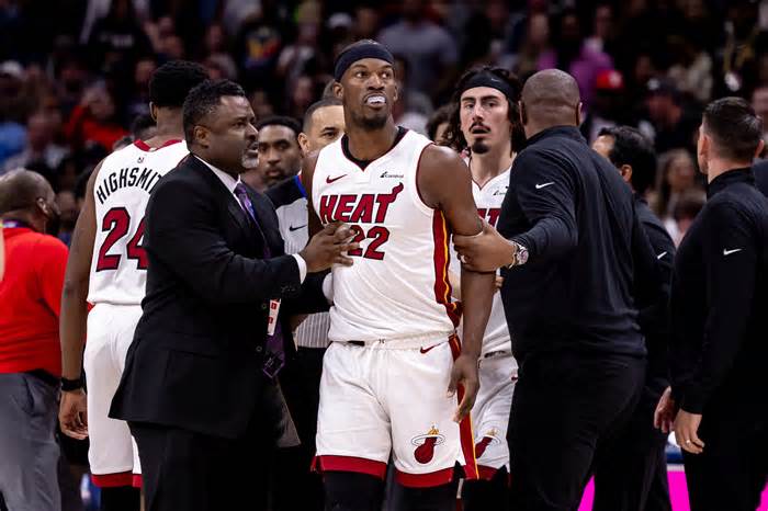 Miami Heat forward Jimmy Butler (22) and New Orleans Pelicans forward Naji Marshall (8) and guard Jose Alvarado (15) are ejected after a melee due to a play during the second half.