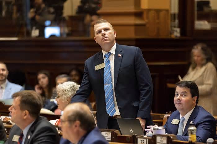 State Rep. Joseph Gullett, R-Dallas, watches the voting board following the vote on prosecutor oversight bill SB 332 at the House of Representatives in the Capitol in Atlanta on Tuesday, March 5, 2024. Gullett sponsored the bill in the House. (Arvin Temka/Atlanta Journal-Constitution via AP)