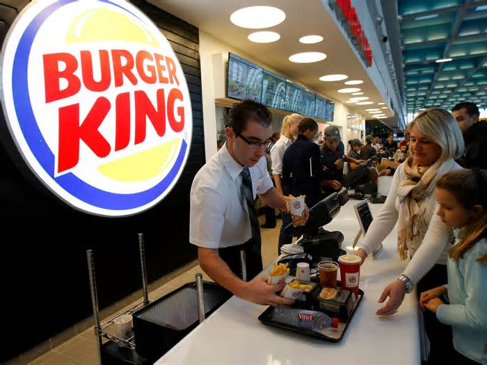 Burger King's owner is buying the chain's largest franchisee for $1 billion. It plans to flip 600 restaurants and sell them to 'motivated' operators.