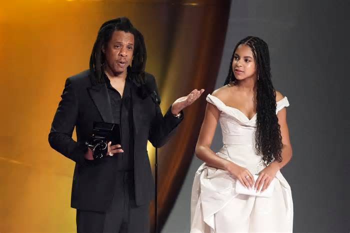 Feb 4, 2024; Los Angeles, CA, USA; Jay-Z , left, accepts the Dr. Dre Global Impact Award with his daughter Blue Ivy on stage during the 66th Annual Grammy Awards at Crypto.com Arena in Los Angeles on Sunday, Feb. 4, 2024. Mandatory Credit: Robert Hanashiro-USA TODAY ORG XMIT: USAT-749235 ORIG FILE ID: 20240204_tdc_usa_0624.JPG
