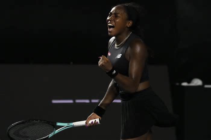 Coco Gauff of the United States celebrates after defeating Marketa Vondrousova, of the Czech Republic, during a women's singles match at the WTA Finals tennis championships, in Cancun , Mexico, Friday, Nov. 3, 2023. (AP Photo/Fernando Llano)