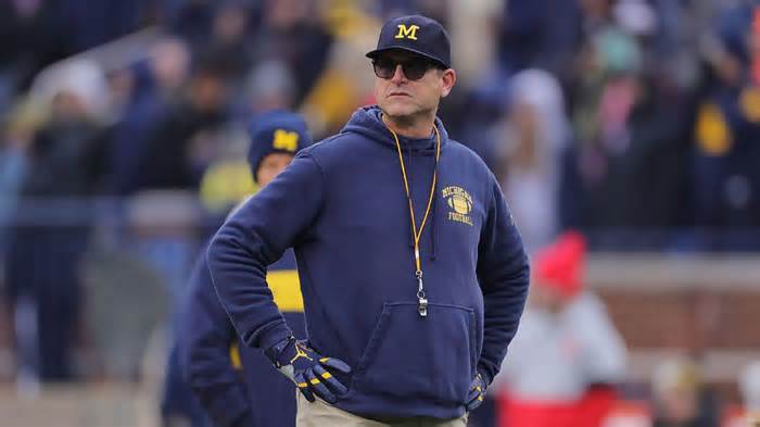Sources: Big Ten to ban Michigan's Jim Harbaugh from field