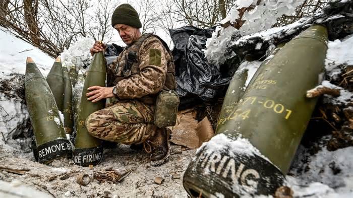 A Ukrainian serviceman prepares 155-mm artillery shells near the front line in Zaporizhzhia, amid Russia's attack on Ukraine, on January 14, 2024. - Reuters