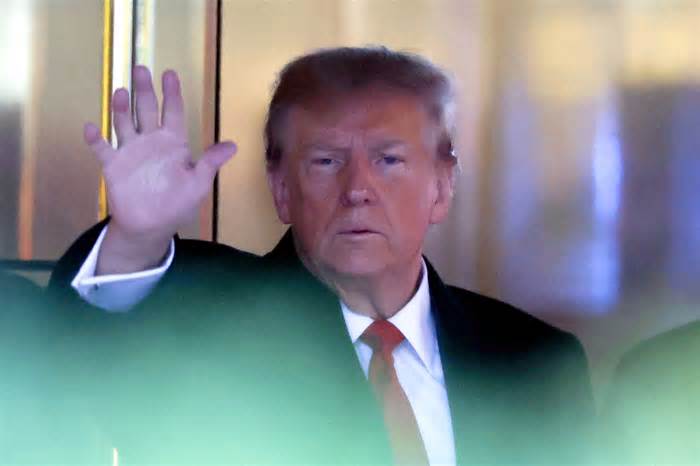 Former US President Donald Trump leaves Trump Tower for Manhattan federal court to attend his defamation trial in New York on Jan. 26, 2024.
