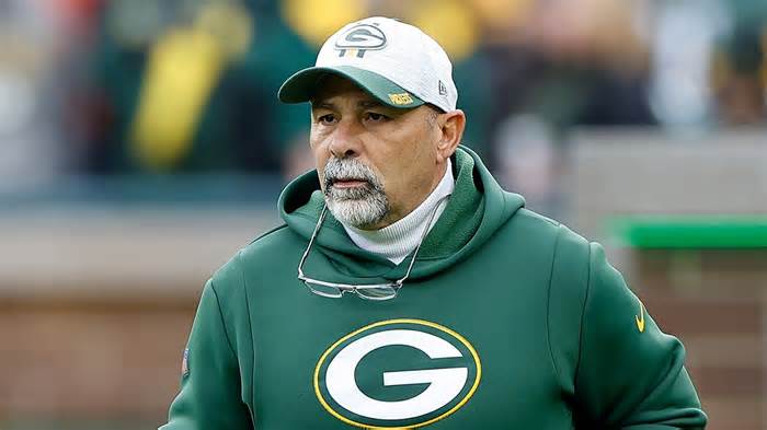 Special teams coach Rich Bisaccia of the Green Bay Packers runs onto the field before the game against the Los Angeles Rams at Lambeau Field on November 05, 2023 in Green Bay, Wisconsin.