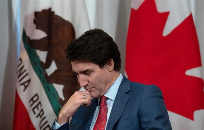 Prime Minister Justin Trudeau listens as California Governor Gavin Newsom delivers remarks at the start of a meeting in San Francisco on Nov. 15, 2023.