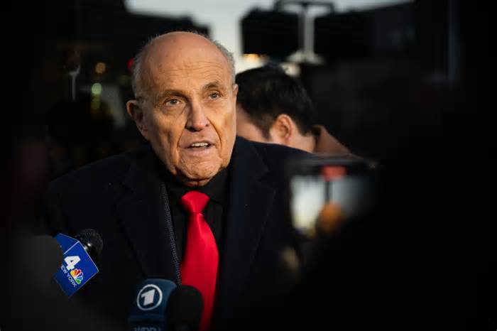 Rudy Giuliani speaks to the media
