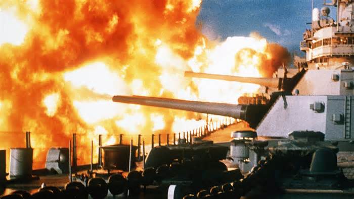Battleship USS New Jersey firing a salvo during deployment off Beirut, Lebanon, 9 Jan 1984.