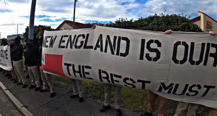A still of a video posted on Sept. 19, 2023, by the Nationalist Social Club to its public page on Telegram. The neo-Nazi group said it was demonstrating outside the Red Roof Inn hotel in Framingham.