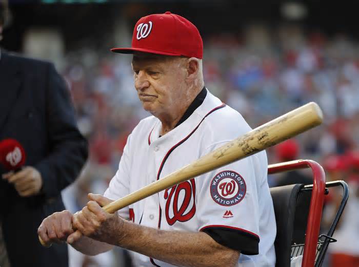 FILE - Former Washington Senators player Frank Howard grips a baseball bat during a pregame ceremony at Nationals Park, Aug. 26, 2016, in Washington. Former major leaguer Howard has died at the age of 87. A spokesperson for the Washington Nationals confirmed the team was informed of Howard's death Monday, Oct. 30, 2023, by his family. (AP Photo/Pablo Martinez Monsivais, File)