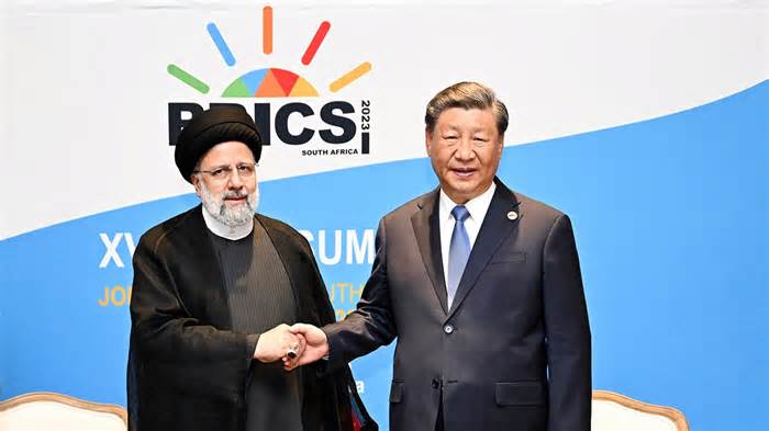 Chinese President Xi Jinping meets with Iranian President Ebrahim Raisi on the sidelines of the 15th BRICS Summit in Johannesburg, South Africa, Aug. 24, 2023.