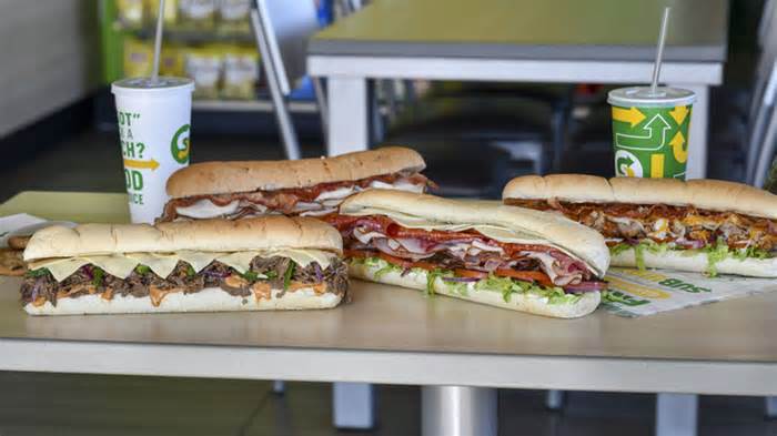 subway table with sandwiches